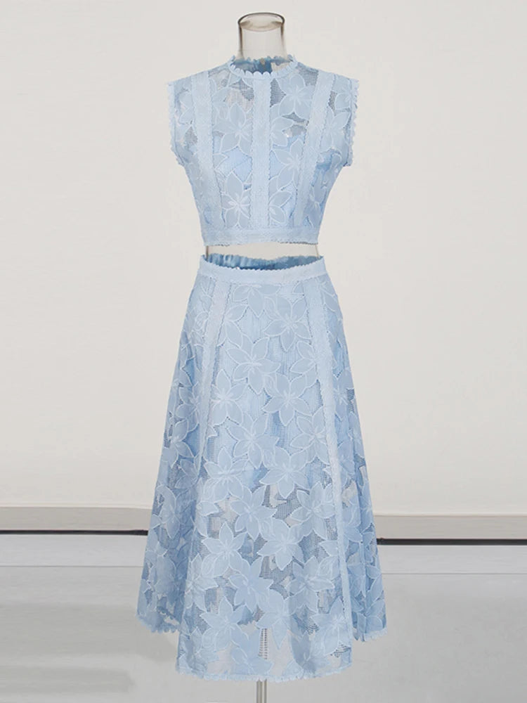 Zalia Atelier | A blue two-piece outfit set featuring a sleeveless top with an O-neck and a high-waisted A-line skirt.