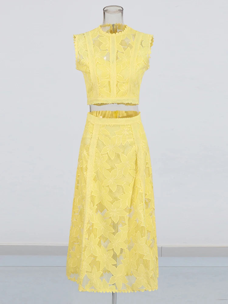 Zalia Atelier | A yellow two-piece outfit set featuring a sleeveless top with an O-neck and a high-waisted A-line skirt.