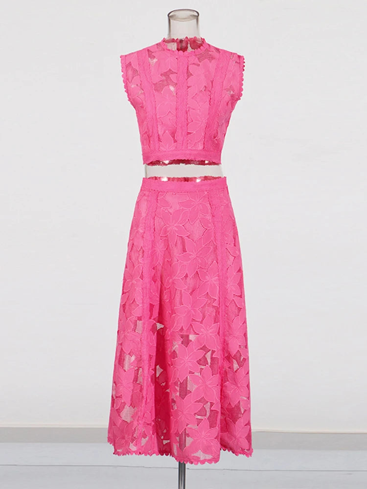 Zalia Atelier | A pink two-piece outfit set featuring a sleeveless top with an O-neck and a high-waisted A-line skirt.